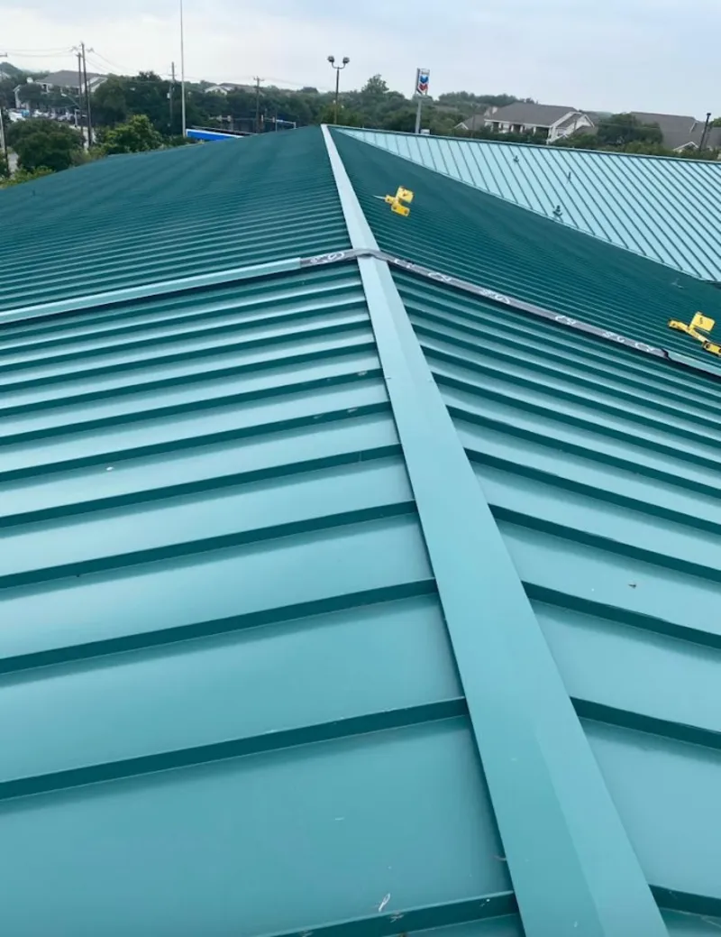 Green commercial metal roof ridge and valley for Metal Roof Repair in Blacksburg